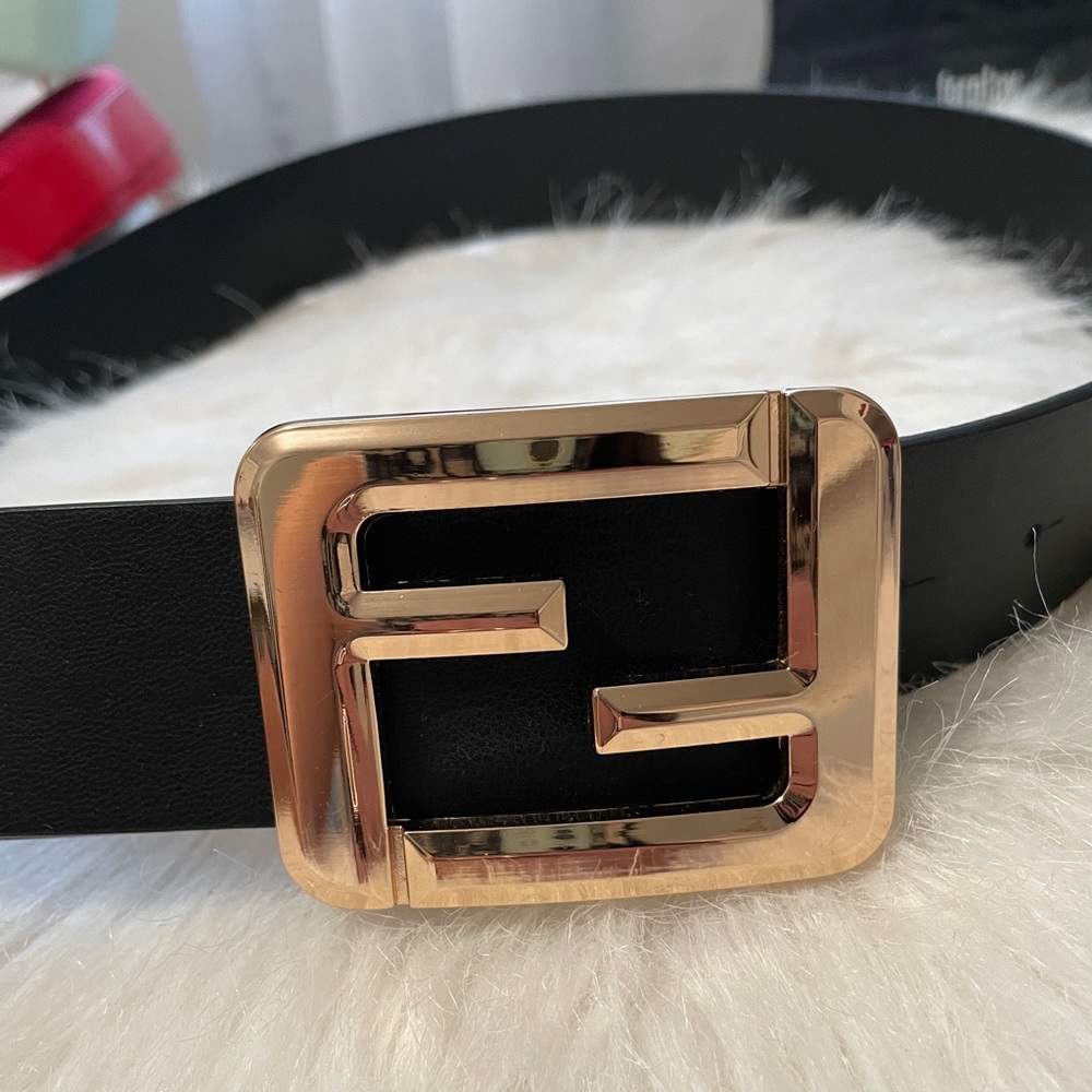 F black and gold belt